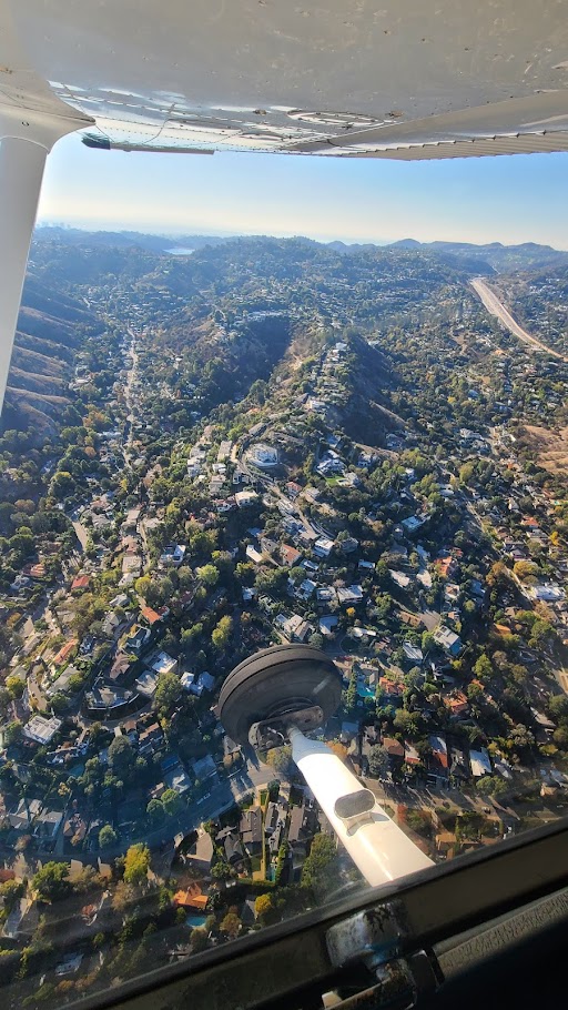 Fly in a plane over LA With Pro Pilot