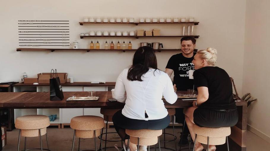Custom candle making in Heights boutique